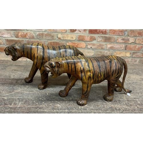 415 - Pair of Indian Kashmiri painted leather standing tigers, naturalistic form with glass eyes, 39 x 70c... 