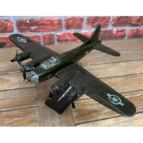 345 - A pair of hand made wooden model American Air Force planes, with original stands, the largest 28 x 4... 