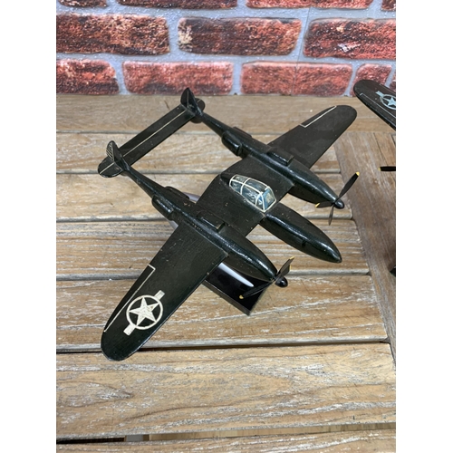 345 - A pair of hand made wooden model American Air Force planes, with original stands, the largest 28 x 4... 