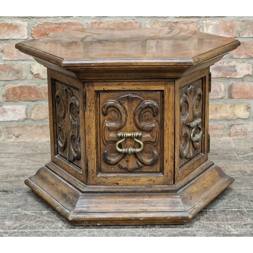 1315 - 20th century hexagonal table with carved detail, the two hinged doors fitted with brass handles, H 5... 