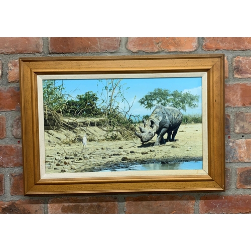 1511 - Craig Bone (1955-) Rhinoceros at the watering hole, signed, oil on canvas, 48cm x 28cm, framed