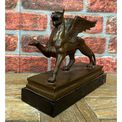 516 - Antique bronze sculpture of a Griffin mounted atop rectangular marble base, L 30cm x H 26cm