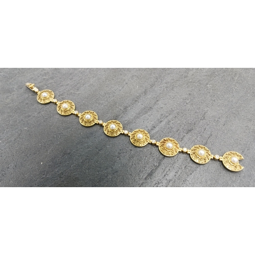 131 - Good quality 18ct pearl and diamond Etruscan style panel bracelet, each circular filigree sunburst p... 