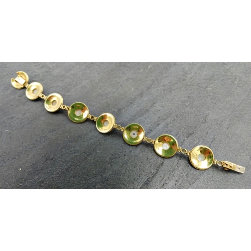 131 - Good quality 18ct pearl and diamond Etruscan style panel bracelet, each circular filigree sunburst p... 