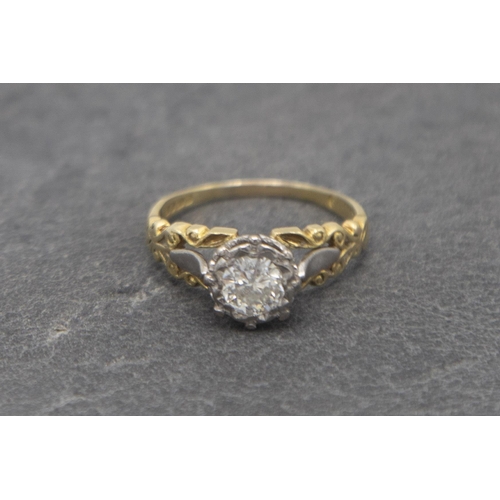 136 - Good 18ct diamond solitaire ring, 0.65ct diamond with stylised floral shoulders, size O, 4.1g