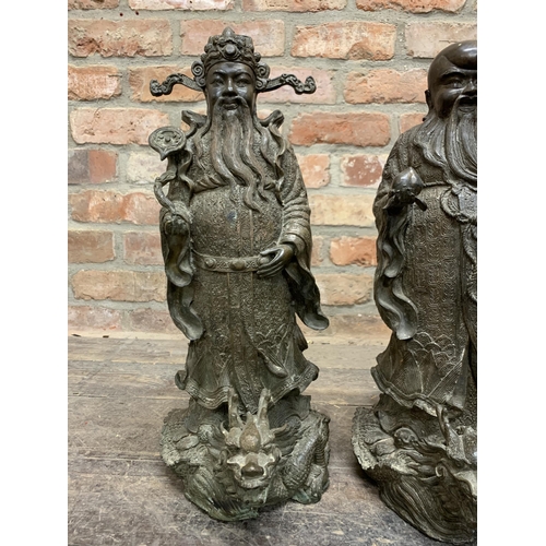 394 - Three impressive Chinese bronze Sanxing Deity immortal figures atop dragons, Lu Xing, Fu Xing and Sh... 