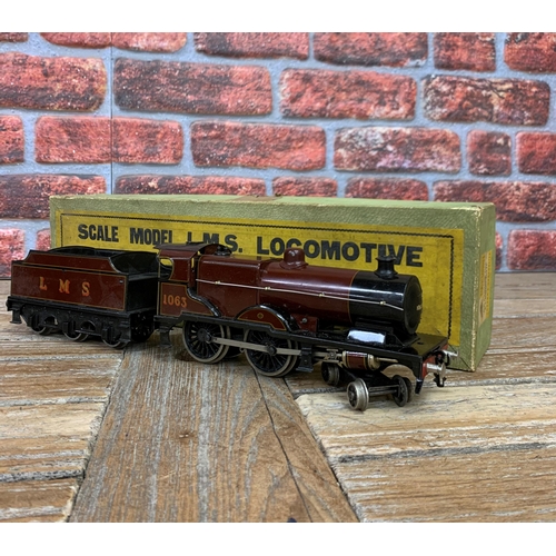 592 - Bassett Lowke 'O' gauge 1948-1950 LMS 1063 locomotive train with two additional 'O' gauge Exley carr... 