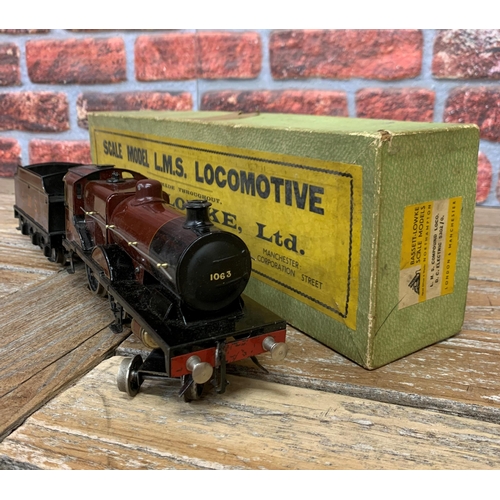 592 - Bassett Lowke 'O' gauge 1948-1950 LMS 1063 locomotive train with two additional 'O' gauge Exley carr... 