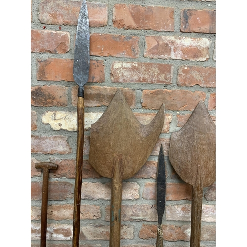 398 - Quantity of Oceanic tribal ceremonial paddles with a further collection of stone made steel tipped s... 