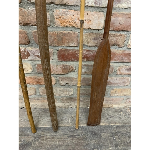 398 - Quantity of Oceanic tribal ceremonial paddles with a further collection of stone made steel tipped s... 