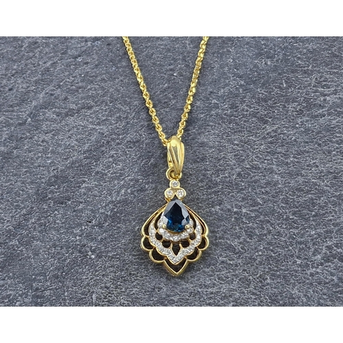 42 - 18ct Sapphire and Diamond fan pendant and chain, the chain 45cm long, 8.8g