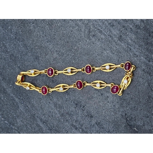 44 - Good quality 18ct ruby cabochon and diamond bracelet, with seven rubies and seven .15 diamonds, make... 