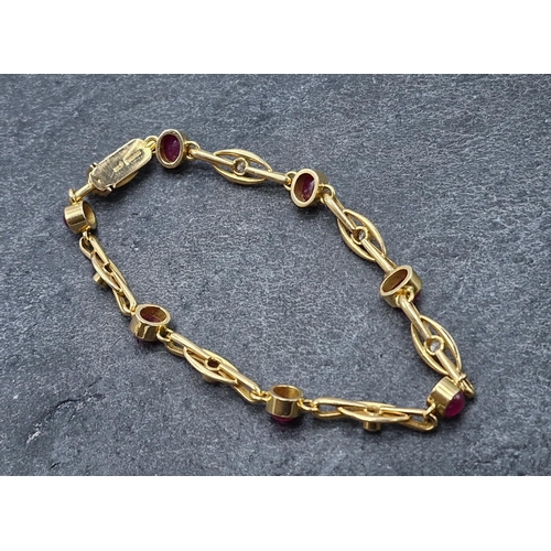 44 - Good quality 18ct ruby cabochon and diamond bracelet, with seven rubies and seven .15 diamonds, make... 