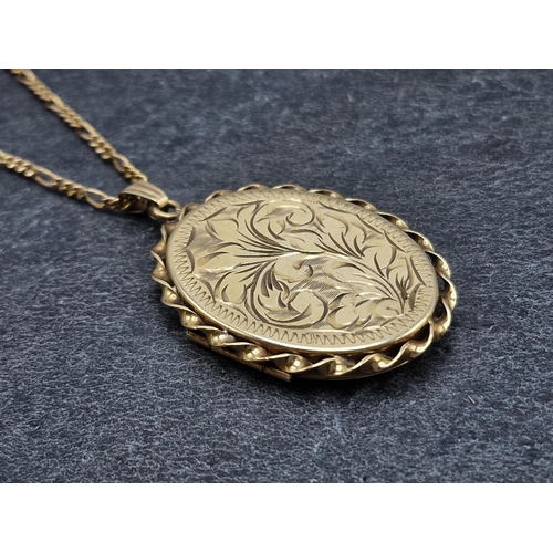 67 - 9ct locket pendant and chain, the chain 50cm long, 10.4g