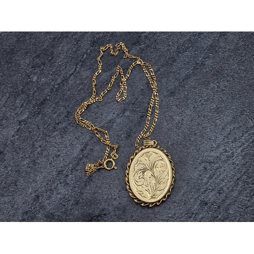 67 - 9ct locket pendant and chain, the chain 50cm long, 10.4g