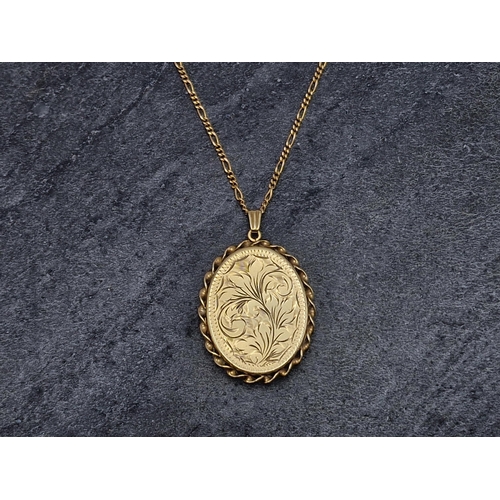 67 - 9ct locket pendant and chain, the chain 50cm long, 10.4g