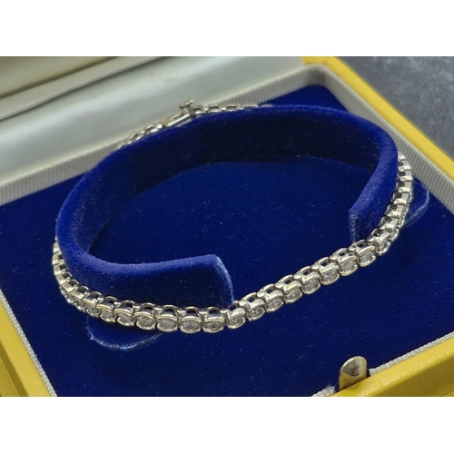 78 - 18ct diamond Tennis line bracelet, fifty four 3.00ct approx total, 19cm long, 16.5g, with profession... 