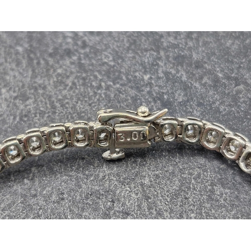 78 - 18ct diamond Tennis line bracelet, fifty four 3.00ct approx total, 19cm long, 16.5g, with profession... 