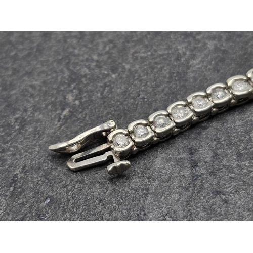 78 - 18ct diamond Tennis line bracelet, fifty four 3.00ct approx total, 19cm long, 16.5g, with profession... 