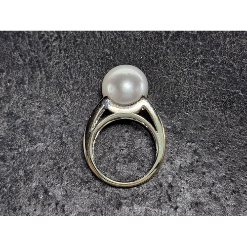 80 - 18ct white gold, pearl and diamond dress ring, large Southsea pearl with 24 round brilliant cut diam... 