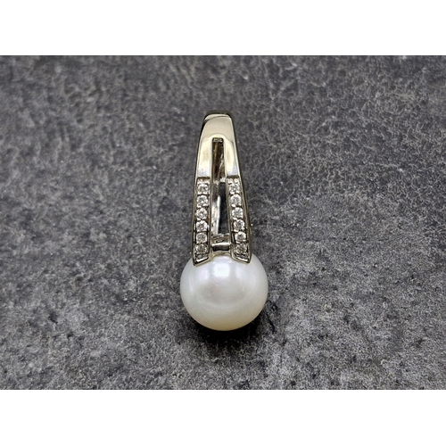 80 - 18ct white gold, pearl and diamond dress ring, large Southsea pearl with 24 round brilliant cut diam... 