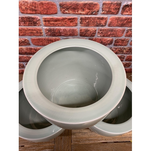 403 - Three large contemporary Chinese celadon planters, H 28cm x D 41cm (3)