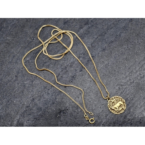 87 - 10k Aries pendant, on a long marked (indistinct) snake chain, chain 81cm, 10.7g