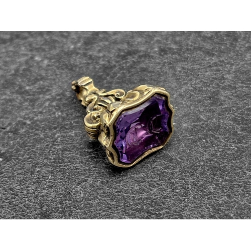 89 - Antique yellow metal amethyst seal, inscribed CC, 25mm high, 6g