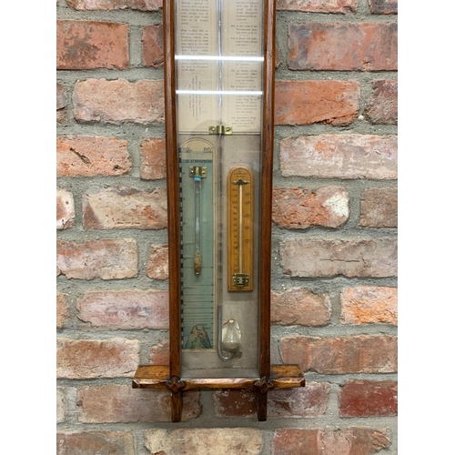 307 - Admiral Fitzroy mercury barometer held in Arts & Crafts style casing, having internal thermometer an... 