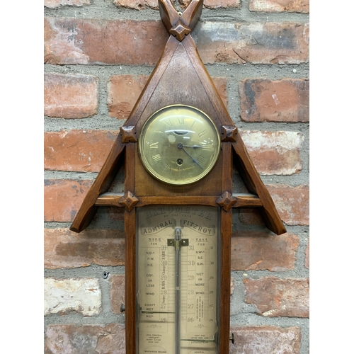 307 - Admiral Fitzroy mercury barometer held in Arts & Crafts style casing, having internal thermometer an... 