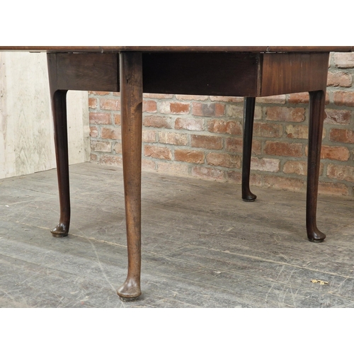 1248 - Georgian mahogany drop leaf dining table raised on pad feet, H 74cm x W 183cm x D 105cm