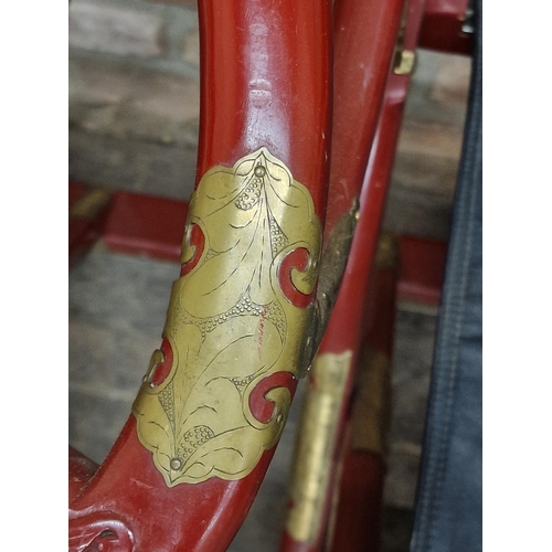 1249 - Pair of 20th century Chinese folding red lacquered horseshoe chairs with applied brass mounts and ca... 