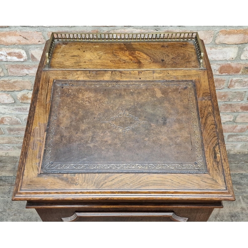 1255 - 19th century rosewood davenport fitted with leather inset hinged writing slope and an arrangement of... 