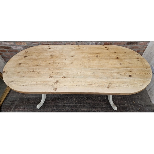 1260 - Antique pine oval dining table with stripped top and twin turned baluster column base, H 76cm x W 21... 