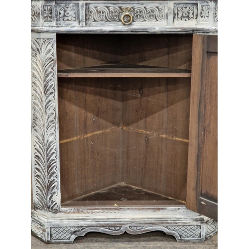 1262 - Antique profusely carved limed oak corner cupboard with raised back, H 164cm x W 76cm