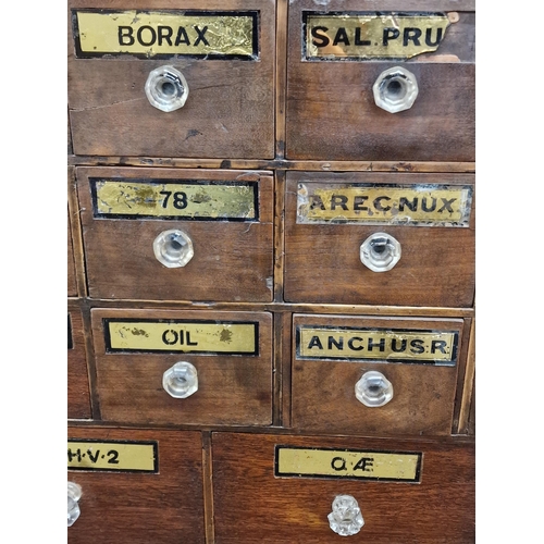 1269 - Exceptional quality Victorian apothecary bank of drawers, fitted with an arrangement of thirty four ... 