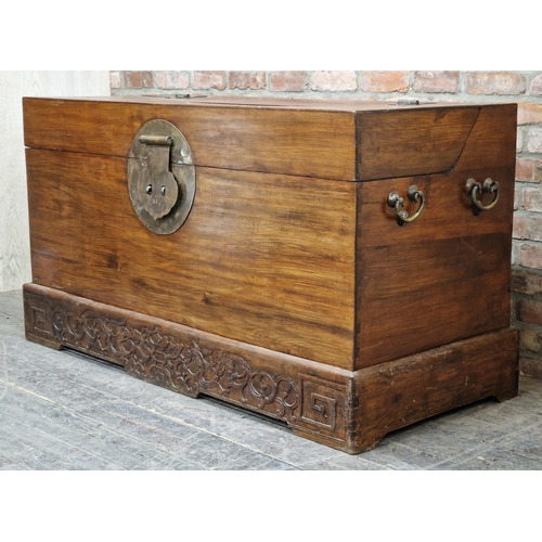 1282 - Large 20th century Chinese camphor wood chest on stand with hinged lid and carved detail to base, H ... 