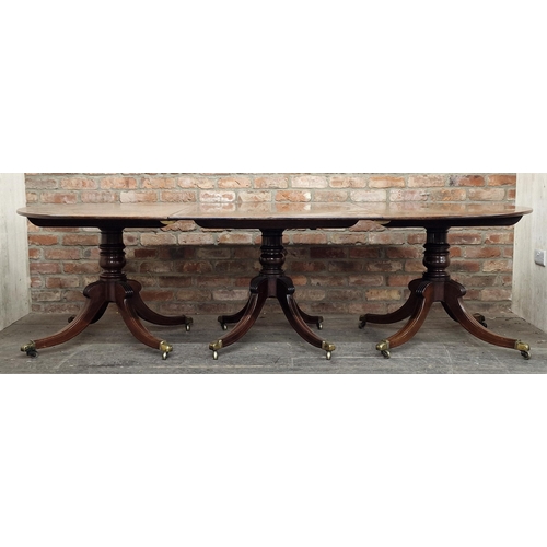 1289 - Good quality 19th century mahogany and satinwood inlaid three pillar dining table, raised on quadrup... 