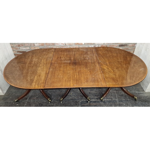 1289 - Good quality 19th century mahogany and satinwood inlaid three pillar dining table, raised on quadrup... 