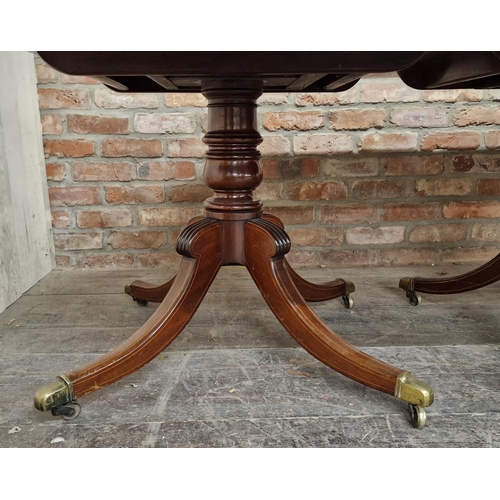 1289 - Good quality 19th century mahogany and satinwood inlaid three pillar dining table, raised on quadrup... 