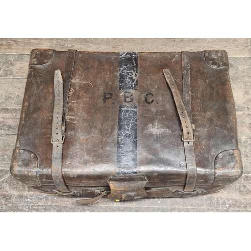 606 - Victorian leather travel trunk, H 31cm x W 84cm x D 56cm