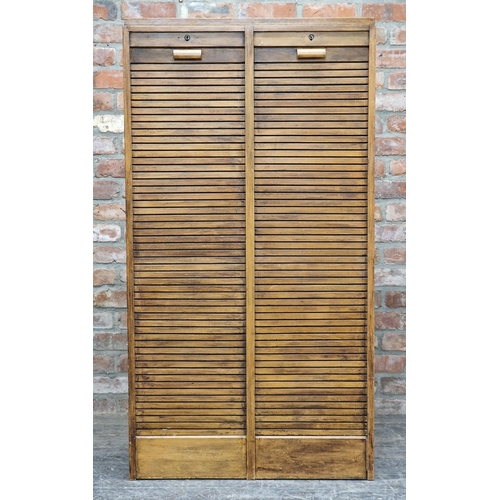 1302 - Vintage 20th century oak double tambour fronted filing cabinet with key, H 150cm x W 81cm x D 35cm