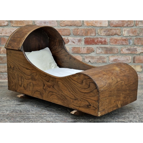 1304 - Antique oak rocking cradle complete with bedding, H 60cm x W 93cm x D 51cm