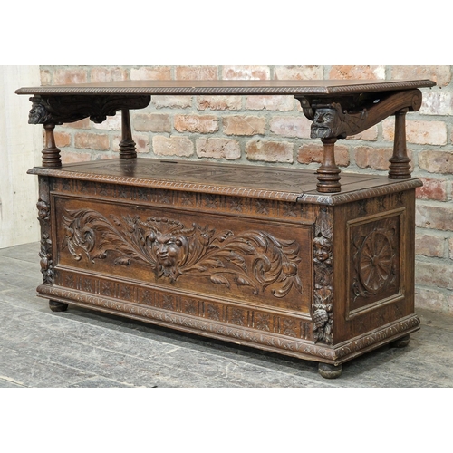 1334 - Good 19th century oak Monks Bench with box seat, profusely carved detail throughout depicting bearde... 