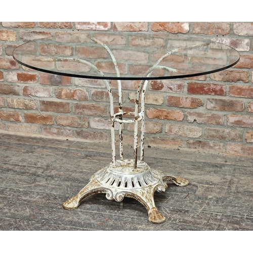 1006 - 20th century French painted iron garden table with glass top, raised on paw feet, stamped Ew Depose,... 