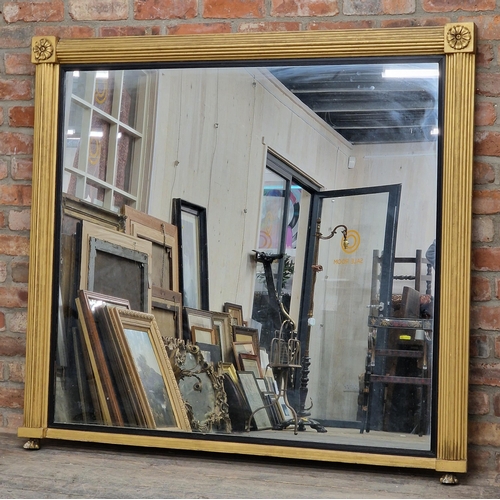 1439 - Large 19th century giltwood overmantle mirror with ebonised slip and reeded columns, raised on claw ... 