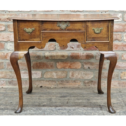 1347 - Georgian oak lowboy fitted with three drawers raised on cabriole legs, H 70cm x W 78cm x D 52cm