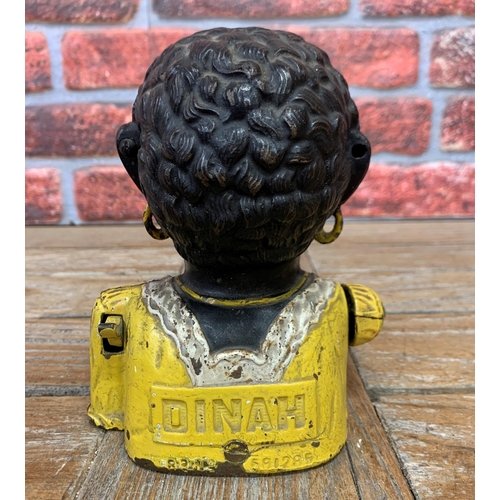 521 - Unusual female Jolly Negro 'Dinah' cast iron money bank, H 16cm