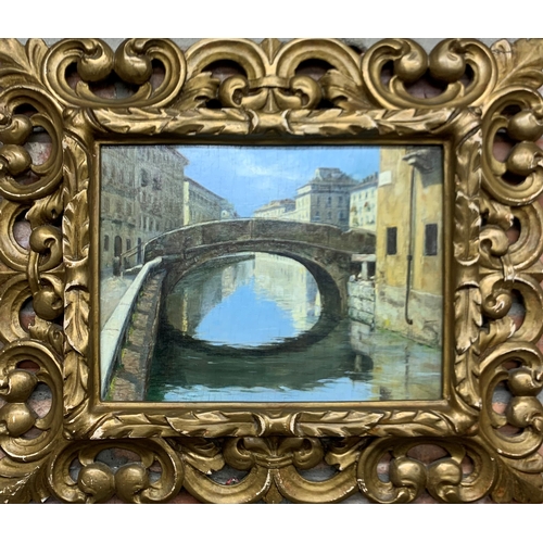 1548 - Venetian School - 'Ponte de Mediu', a Venetian bridge over the canal, indistinctly signed, titled an... 