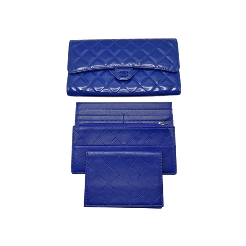 281 - Chanel blue leather shiny clutch bag with cash wallet, card holder and passport cover, to include or... 